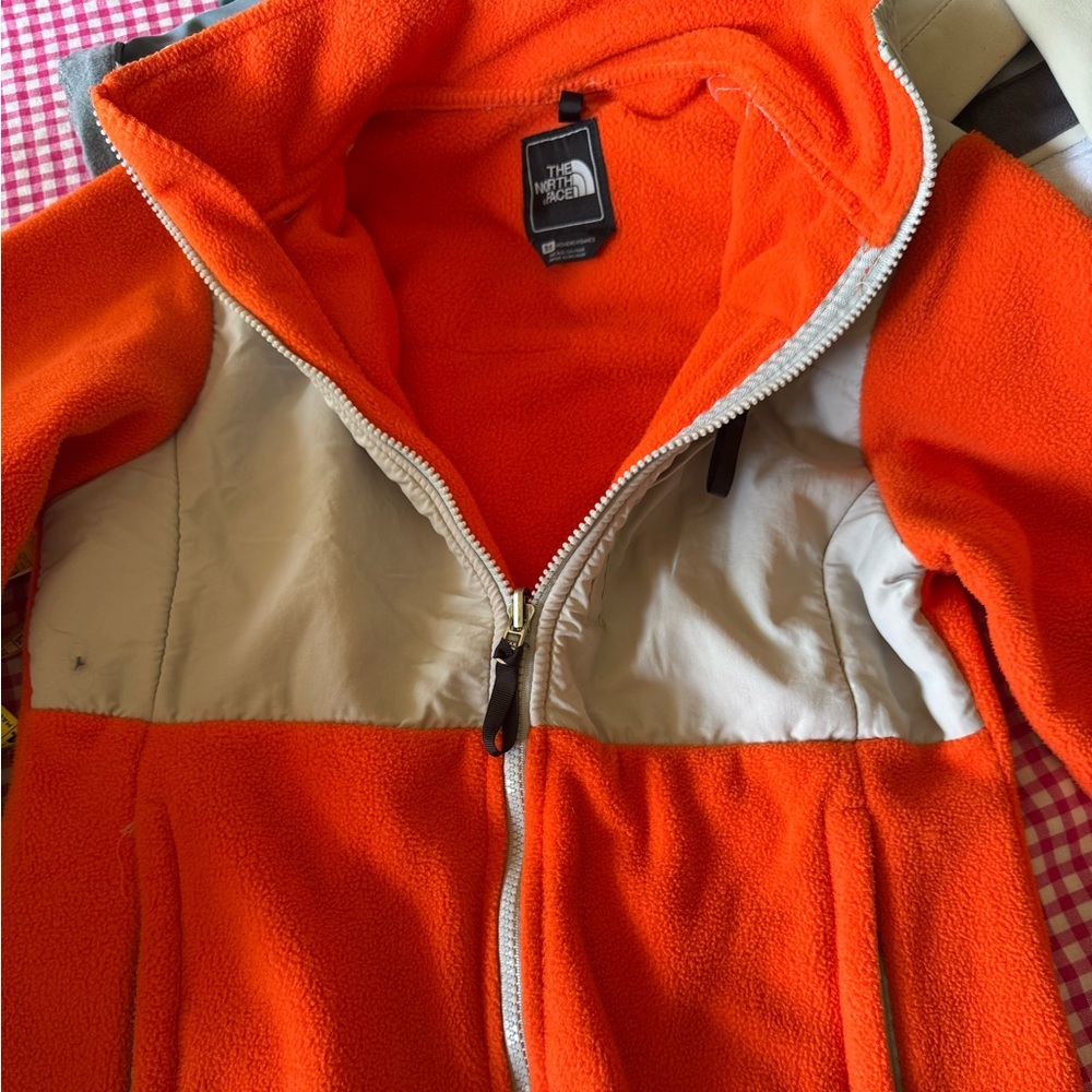Orange coat Not listing due